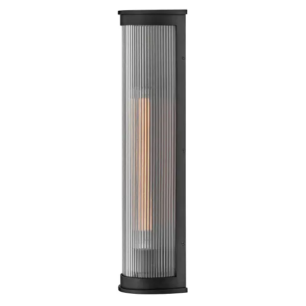 The Bluffton LED Wall Lantern combines classic lantern styling with contemporary LED technology. Its clear ribbed glass creates beautiful light refractions while the durable composite frame resists fading in outdoor conditions.