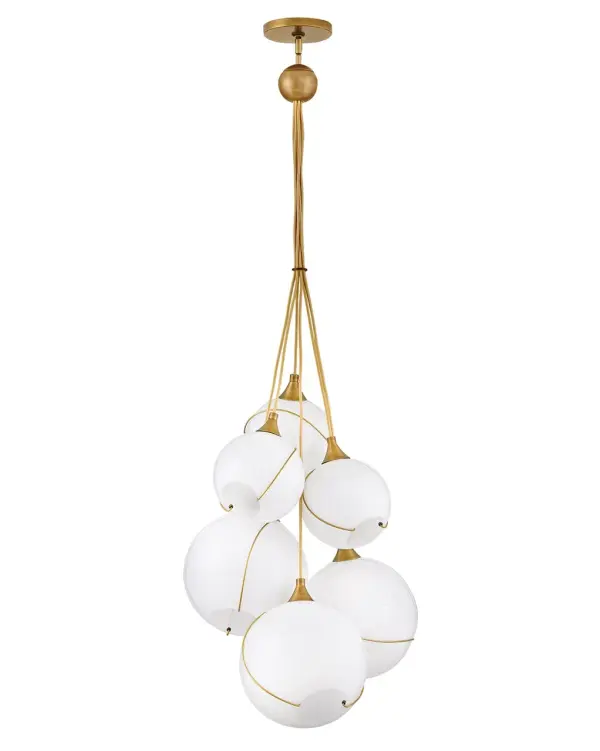 Mesmerizingly asymmetrical with a bohemian, midcentury modern flair, Skye showcases stunning globes of clear or cased opal glass with off-center openings. Slender rings and delicate details in Heritage Brass or Black finishes pull the look together, while adjustable wires allow you to create the perfect look for your space. - alternate view