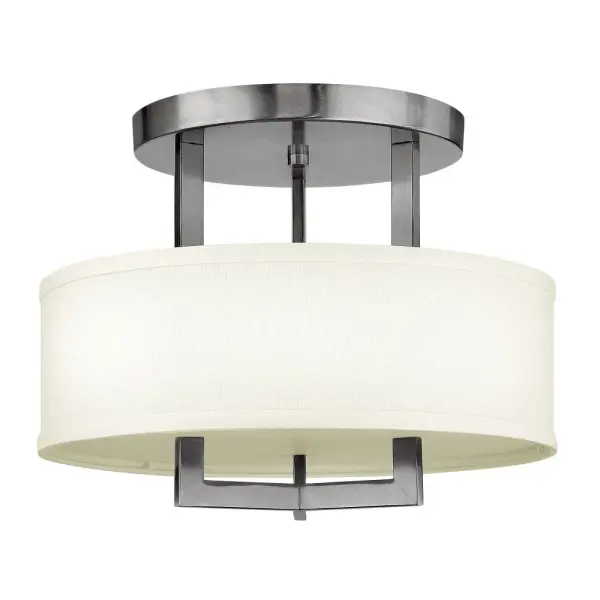 Hampton is a modern transitional design, offering the ultimate in urban sophistication. The minimal, rectangular frame, paired with a decorative acrylic etched bottom lens, is softened by a contemporary off-white linen drum shade.