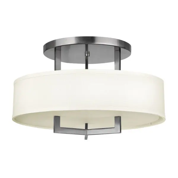 Hampton is a modern transitional design, offering the ultimate in urban sophistication. The minimal, rectangular frame, paired with a decorative acrylic etched bottom lens, is softened by a contemporary off-white linen drum shade.