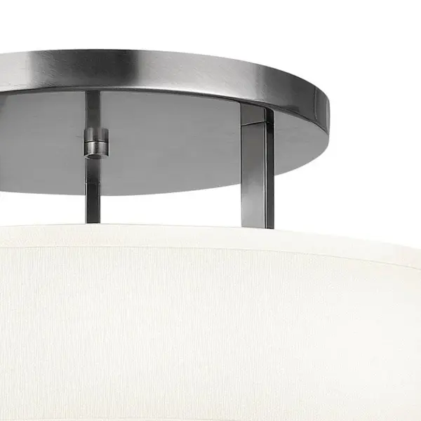 Hampton is a modern transitional design, offering the ultimate in urban sophistication. The minimal, rectangular frame, paired with a decorative acrylic etched bottom lens, is softened by a contemporary off-white linen drum shade. - alternate view