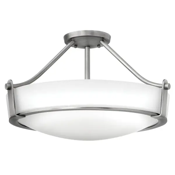Hathaway’s striking design features a bold shade held in place by three intersecting, floating arms with unique forged uprights and ring detail for a modern style. Available in Heritage Brass with etched glass, Olde Bronze with etched glass, Olde Bronze with etched amber glass and Antique Nickel with etched glass.