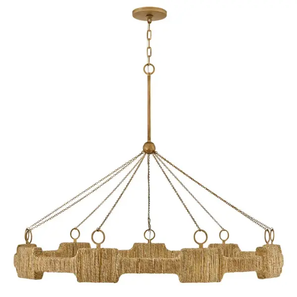 Raffi's coastal bohemian vibe is balanced by its distinctively modern shape. A unique LED design offers abundant light, while a slim frame hand-wrapped in natural reeds provides unexpected texture. Bold Carbon Black or Burnished Gold finishes perfectly complement any color palette. - alternate view