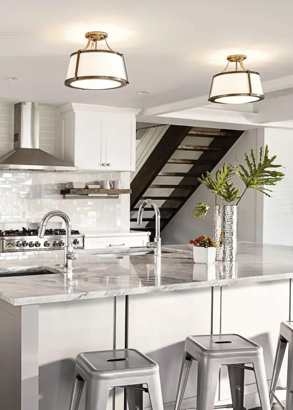 The Charlotte blends vintage charm with modern LED efficiency. Its textured off-white fabric shade and brushed caramel finish create warm, diffused light perfect for traditional and transitional spaces with lower ceilings. - alternate view