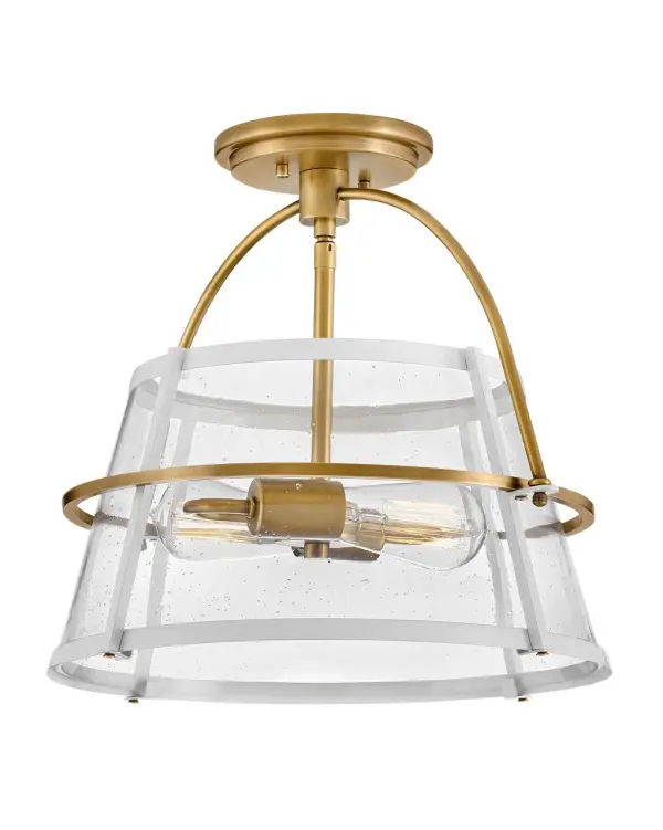 Tournon merges timeless appeal with contemporary functionality. The steel frame holds the clear seedy glass shade surrounding the bulbs within. An oversized yoke completes the midcentury modern design. - alternate view