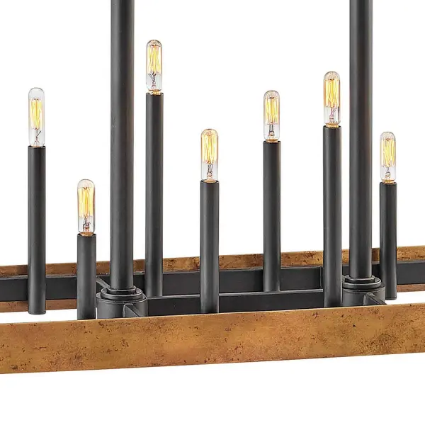 Authentic, vintage lighting that feels at home in an industrial setting is right in the wheelhouse for Wells. A wide band of solid weathered brass lays a firm foundation for a striking centerpiece to any space. Tapered candle sleeves reach up at staggered heights to create a true Old World aesthetic. - alternate view