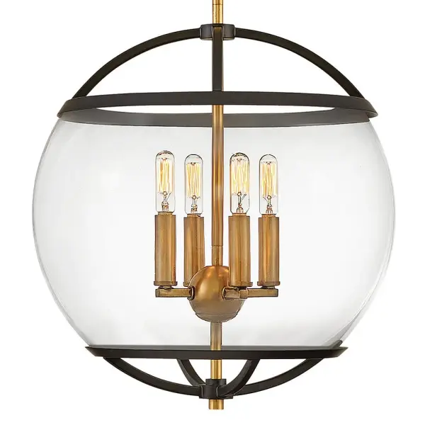 The wide glass band featured in Calvin clearly has global appeal, but the sphere of influence does not stop there. The orb is completed by the rounded, open cage on top and bottom to add style and stability. This mid-century modern silhouette in Heritage Brass or Black with Heritage Brass finish encloses a classic candle cluster. - alternate view