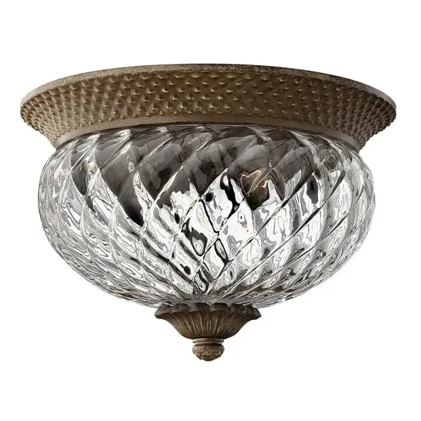 The Plantation flush mount brings vintage glamour with its signature pineapple-shaped elements and elaborate cast detailing. Energy-efficient LED technology meets classic design in a compact profile perfect for lower ceilings.