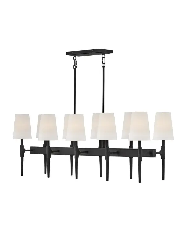 Sleek candle arms topped by softly tapered fabric shades perfectly complement Beaumont's sturdy hand-hammered details. Rustic yet traditional, the stylish transitional silhouette works well in any setting, from classically elegant to chic and modern.