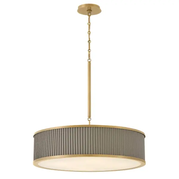 The Arden LED Chandelier combines classic sophistication with modern efficiency. Its pleated faux leather drum shade and Heritage Brass finish create a refined focal point, while integrated LED lighting and etched glass provide warm, inviting illumination perfect for dining and living spaces.