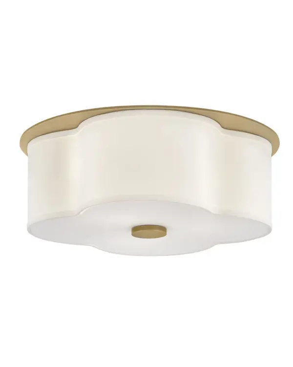 The curved quatrefoil silhouette of Delaney’s off-white linen shade elegantly complements traditional aesthetics. Etched glass softly diffuses light, while an oversized decorative canopy in Heritage Brass or Black provides a subtle contrast.