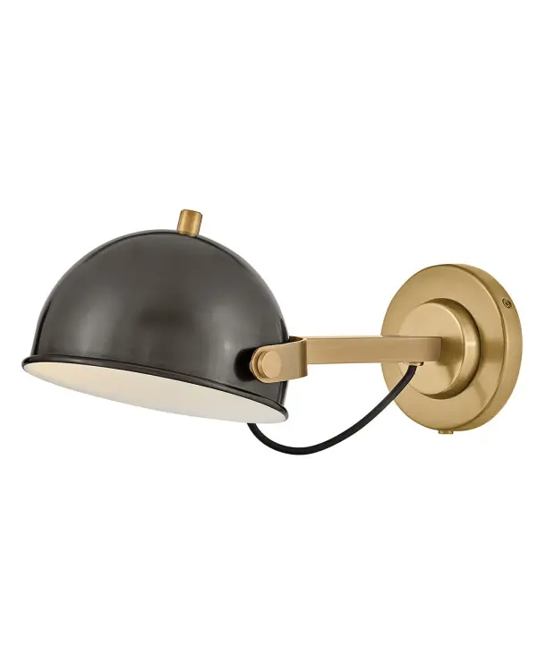A modern bedside sconce with a vintage feel, Spence’s adjustable, rotating shade, painted white interior, and convenient on/off switch create the ideal reading or task light. Heritage Brass details and removable, black, fabric-wrapped cord complement a Black Oxide or Chalk White finish.
