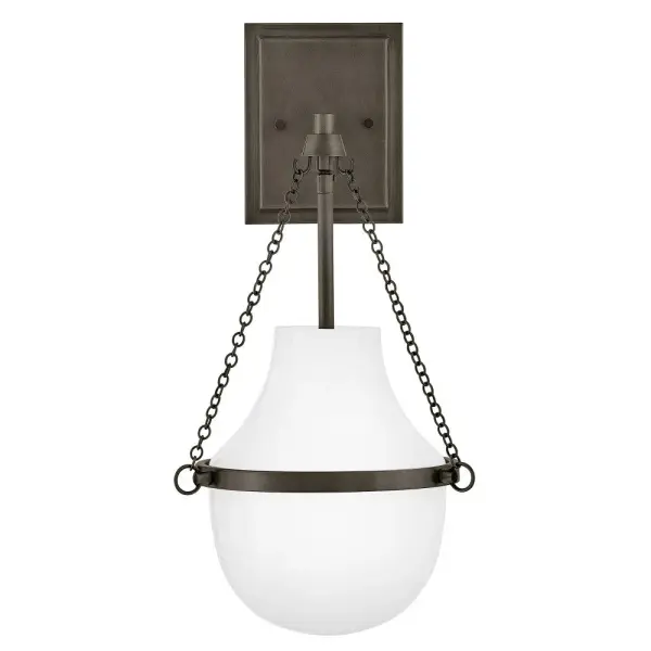 Fusing a sculpted, modern form with classically styled details, Collins features a transitional teardrop shade crafted from blown, Cased Opal glass. A central metal band and delicate chain uprights are available in Black Oxide, Heritage Brass, Heritage Bronze, or Polished Nickel finishes. - alternate view