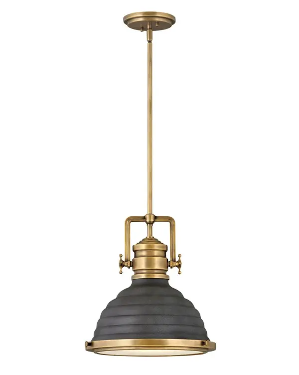 A modern interpretation of the hard-working factory pendant, Keating delivers a robust silhouette with prominent over scaled cast knobs and a boldly ribbed shade in either Heritage Brass or Heritage Brass with Aged Zinc finish options. Refined elements like the ring and knob trim detail and a flat glass lens add sophistication to this striking pendant.