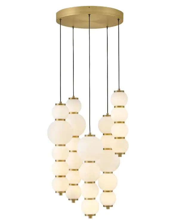 Inspired by the enduring allure of pearl jewelry, Trigo’s softly cascading silhouette makes a dramatic yet elegant statement. Glowing etched opal glass globes of varying sizes create a visual rhythm and organic flow that echo the natural imperfections and unique beauty found in genuine pearls. Differences between each globe add depth and movement, combining classic beauty with modern coastal design and offering a harmonious blend of tradition and innovation.
