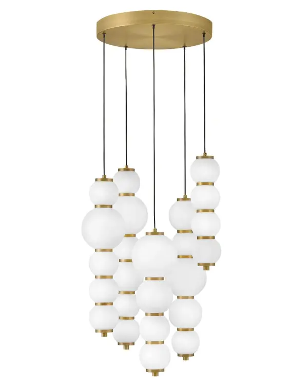 Inspired by the enduring allure of pearl jewelry, Trigo’s softly cascading silhouette makes a dramatic yet elegant statement. Glowing etched opal glass globes of varying sizes create a visual rhythm and organic flow that echo the natural imperfections and unique beauty found in genuine pearls. Differences between each globe add depth and movement, combining classic beauty with modern coastal design and offering a harmonious blend of tradition and innovation. - alternate view