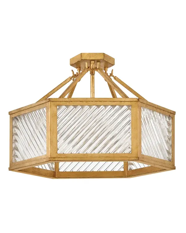 A reimagining of vintage designs from the 40s and 50s, Sura’s transitional, hexagonal Distressed Brass frame creates a glamorous yet understated and tailored appeal. Cylindrical glass rods set at alternating angles echo a soft herringbone pattern, juxtaposing geometry within geometry. Layered details create a reeded effect that is reflective and alluring. - alternate view