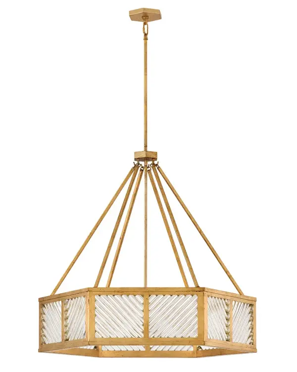 A reimagining of vintage designs from the 40s and 50s, Sura’s transitional, hexagonal Distressed Brass frame creates a glamorous yet understated and tailored appeal. Cylindrical glass rods set at alternating angles echo a soft herringbone pattern, juxtaposing geometry within geometry. Layered details create a reeded effect that is reflective and alluring. - alternate view