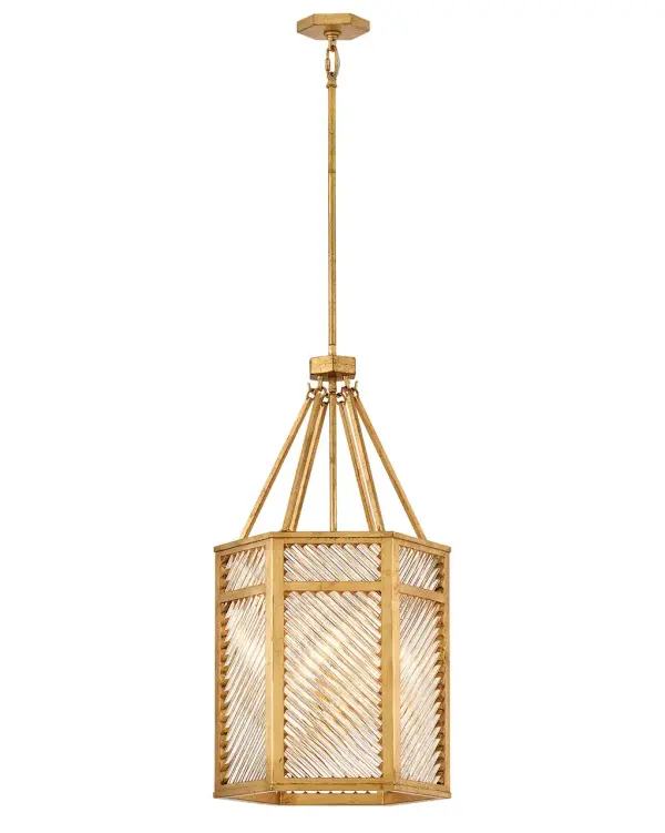 A reimagining of vintage designs from the 40s and 50s, Sura’s transitional, hexagonal Distressed Brass frame creates a glamorous yet understated and tailored appeal. Cylindrical glass rods set at alternating angles echo a soft herringbone pattern, juxtaposing geometry within geometry. Layered details create a reeded effect that is reflective and alluring.
