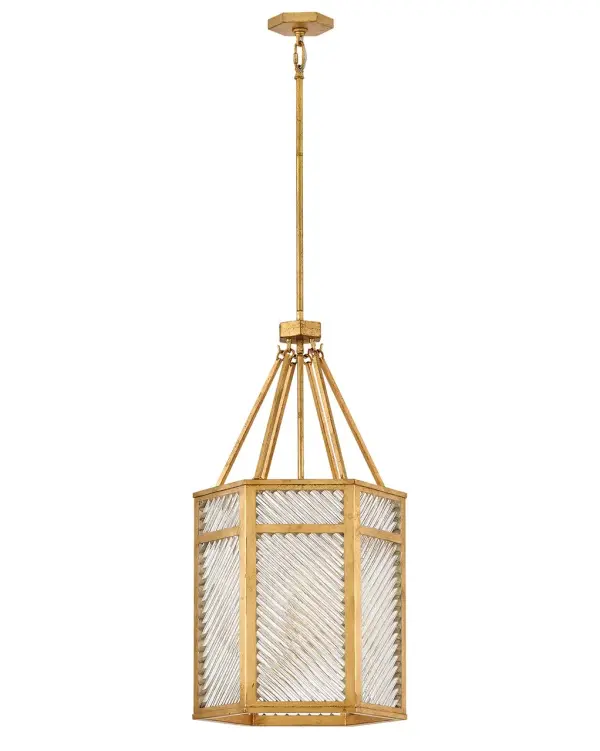 A reimagining of vintage designs from the 40s and 50s, Sura’s transitional, hexagonal Distressed Brass frame creates a glamorous yet understated and tailored appeal. Cylindrical glass rods set at alternating angles echo a soft herringbone pattern, juxtaposing geometry within geometry. Layered details create a reeded effect that is reflective and alluring. - alternate view