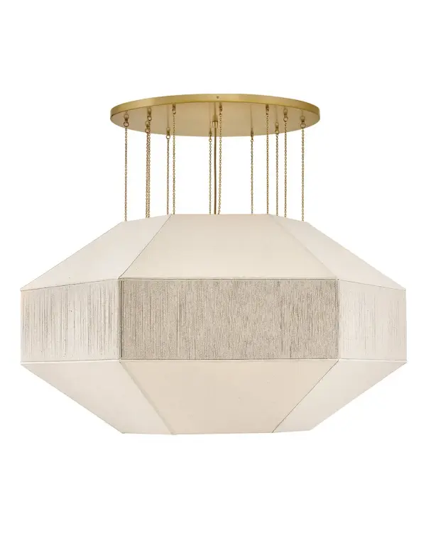 Elegant yet edgy, Lyla’s geometric Oatmeal Linen shade with a textured, wrapped middle band is suspended from refined Lacquered Brass micro-chains – inspired by delicate jewelry designs. A Lacquered Brass canopy, dimmable lamping, and etched white glass diffuser add subtle warmth and a sophisticated atmosphere to the surrounding space. - alternate view