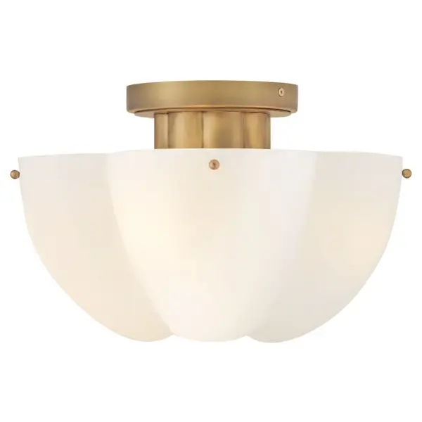 Shapely and beautiful, Becca’s cloverlike shade is hand-blown from etched opal glass and diffuses even bright light throughout your living space. A classic Heritage Brass finish accentuates ribbed detailing.