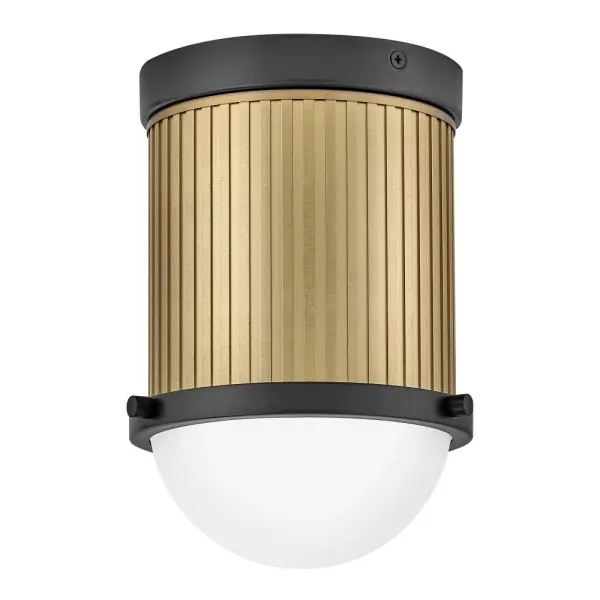 With a midcentury-inspired design, Kieran’s stylishly minimal silhouette accentuates Etched White glass with a transitional frame decorated with ribbed detailing along the central column. Brilliant LED illumination provides a comfortable glow complemented by classic finishes that easily integrate into any décor style. - alternate view