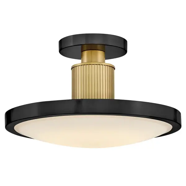 With a midcentury-inspired design, Kieran’s stylishly minimal silhouette accentuates Etched White glass with a transitional frame decorated with ribbed detailing along the central column. Brilliant LED illumination provides a comfortable glow complemented by classic finishes that easily integrate into any décor style.