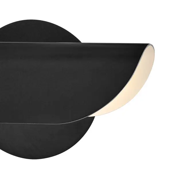 Create a beautiful transitional accent with Barrett’s clean, minimalist design. Its ingenious, folded metal shade adjusts to add contemporary flair to your favorite décor, effortlessly bringing a touch of elegance to your living space. - alternate view