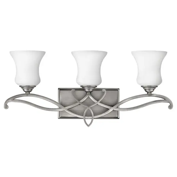 Brooke’s updated traditional look features a minimalist forged scroll design in Antique Nickel that elegantly complements its etched opal glass.