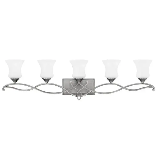 Brooke’s updated traditional look features a minimalist forged scroll design in Antique Nickel that elegantly complements its etched opal glass.