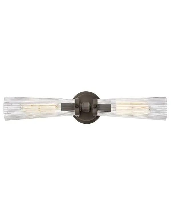 Add a dash of traditional brilliance into your every day with Jude. Featuring fluted glass held in place with decorative knobs; this family showcases timeless; traditional elegance with a unique finish. The light extends from either side; anchored in the middle for a silhouette thatâ€™s as striking as it is functional.