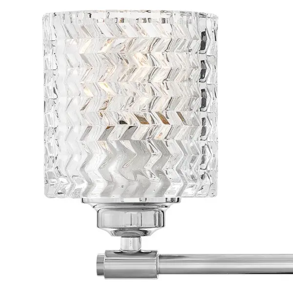 Traditional elegance with a modern edge defines Elle’s graceful design. A rich, chevron cut, clear glass is the dramatic focal point, complemented by a gleaming Chrome finish. The softly rounded steel back plate is finished with luxe stepped detailing to complete the design. - alternate view