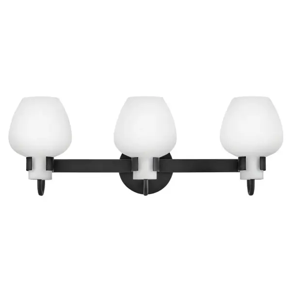 Crafted from timeless etched opal glass, Sylvie’s tulip-shaped shades provide softly diffused illumination and a touch of transitional charm. Minimalist open cuffs and simple back plates ground each fixture with a versatile Black or Heritage Brass finish.