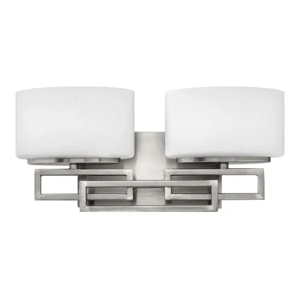 Lanza features contemporary styling with geometric patterns that are emphasized in Antique Nickel, Brushed Bronze and Buckeye Bronze finishes. The elongated oval, etched opal glass reinforces its sleek design.