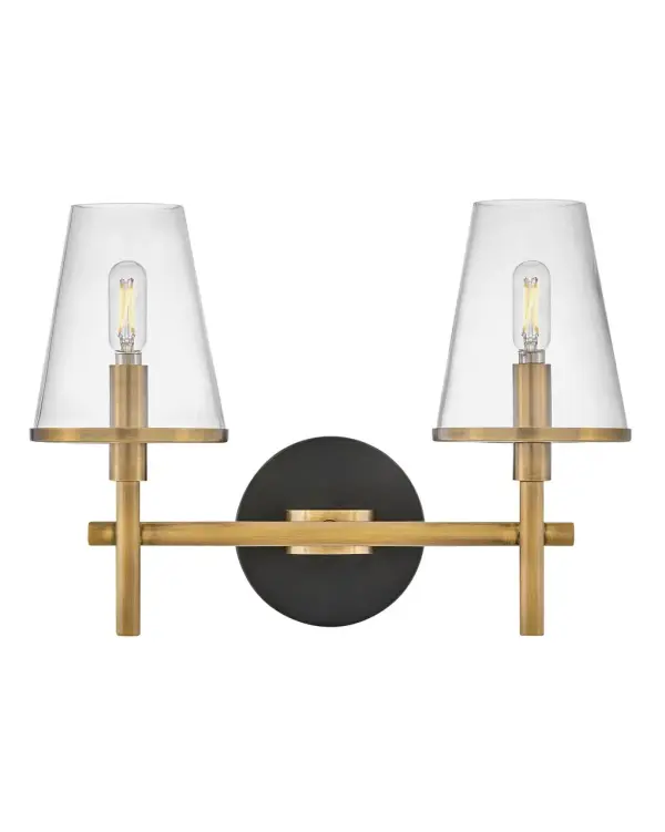 Marten has a clean, crisp look that brings striking transitional elements to any décor style. Clear glass shades have a Heritage Brass rim, perfectly complementing the Black back plate to tie the aesthetic together. The clean lines provide the satisfaction of balanced symmetry while giving off ample light.