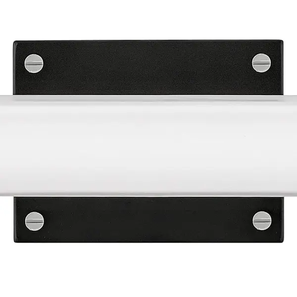 Rollins is both industrial in form and transitional in style. Unique rectangular etched opal glass has softly rounded edges offset by contrasting details on the backplate and the square knobs anchoring either end. This integrated LED design comes in two finish combinations, Black with Chrome and Black with Heritage Brass, and can be hung both vertically and horizontally. - alternate view
