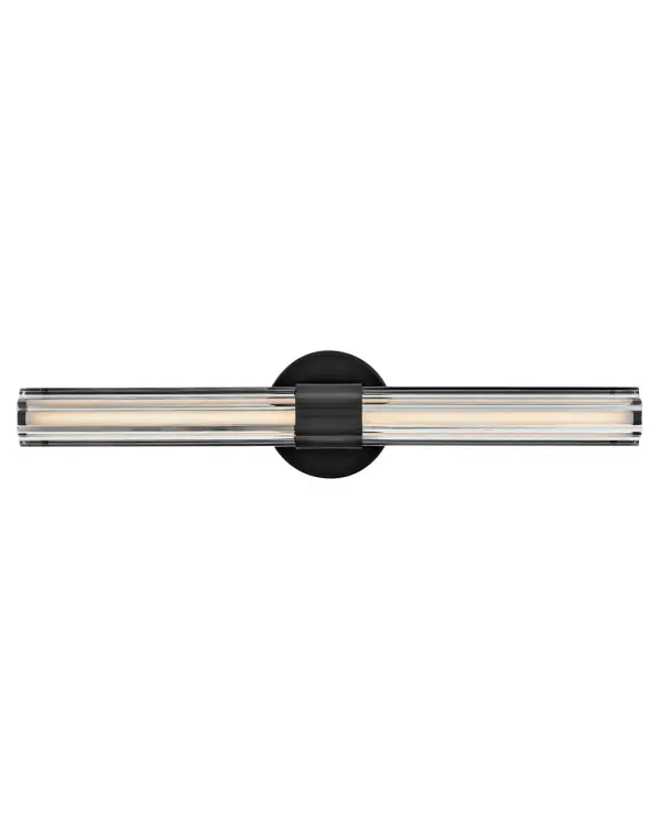 Georgette’s sophisticated silhouette is enhanced by clear fluted crystal, creating a stunning fixture with bold symmetry and captivating details. A chic central cuff and back plate provide balance and contrast that effortlessly complements any space with a Black Oxide or Lacquered Brass finish.