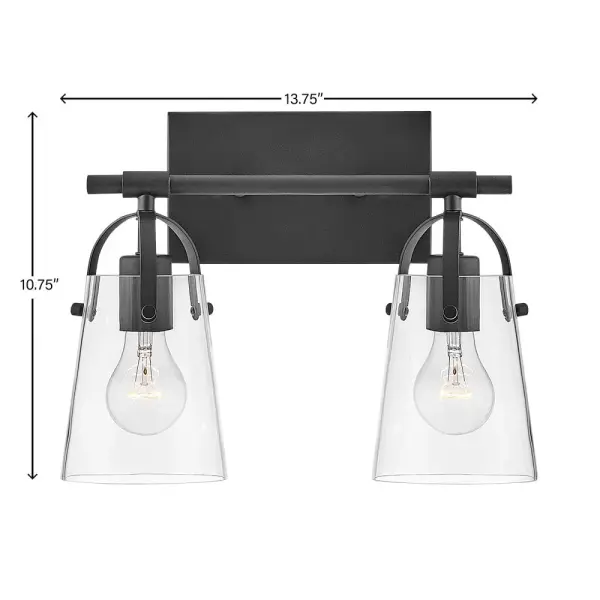 Clean and airy, Foster breathes composed simplicity into any bath space. Softly tapered glass shades suspended from arched handle prongs create a sophisticated transitional silhouette, enhanced by practical yet stylized details. - alternate view