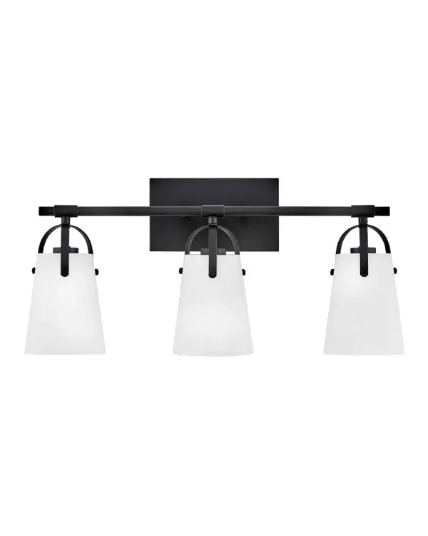 Clean and airy, Foster breathes composed simplicity into any bath space. Softly tapered glass shades suspended from arched handle prongs create a sophisticated transitional silhouette, enhanced by practical yet stylized details.