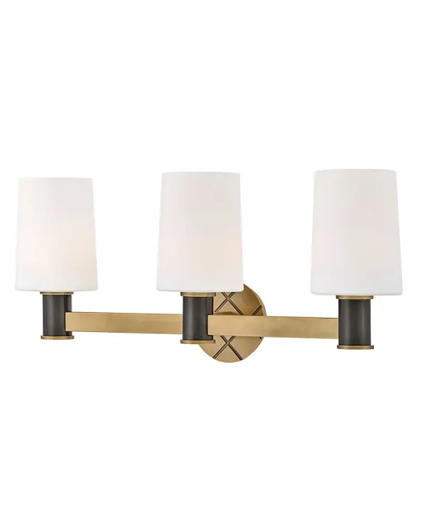 Featuring a geometric, crosshatch motif, Declan’s substantial silhouette is enhanced by a heavy cast backplate and stem accentuated by a contrasting, two-tone finish. Tall, tapered, etched opal glass shades create softly diffused illumination and a comfortable atmosphere. - alternate view
