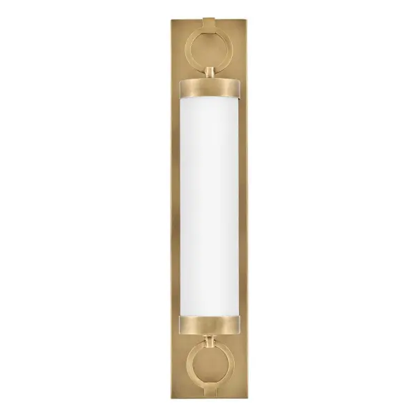 The Baylor LED Vanity combines industrial design elements with functional lighting. Its sturdy steel construction, decorative rings, and etched opal glass create a substantial presence while delivering 2000 lumens of warm, dimmable light.
