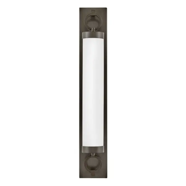 For a fixture that is an industrial piece of art, look to Baylor. The sturdy back plate and decorative rings add a nice balance to the etched opal glass to finish off the strong, substantial look. Ideal for providing plenty of functional light, Baylor mounts cleanly to the wall vertically or horizontally to bring style to primary bath, powder rooms, and more. Baylor is part of the Lisa McDennon Collection.