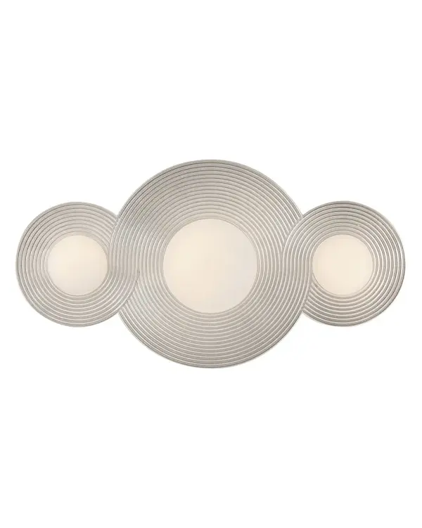 Evoking the concepts of eternity and limitlessness, Rhea’s continuously flowing loops of refined metal create a ribbed texture along its gracefully curved backplate. Dimmable, integrated LED lamping brings comfortable energy into any bathroom or small interior space. Rhea can be installed vertically, horizontally, or even as a flush mount on a ceiling.