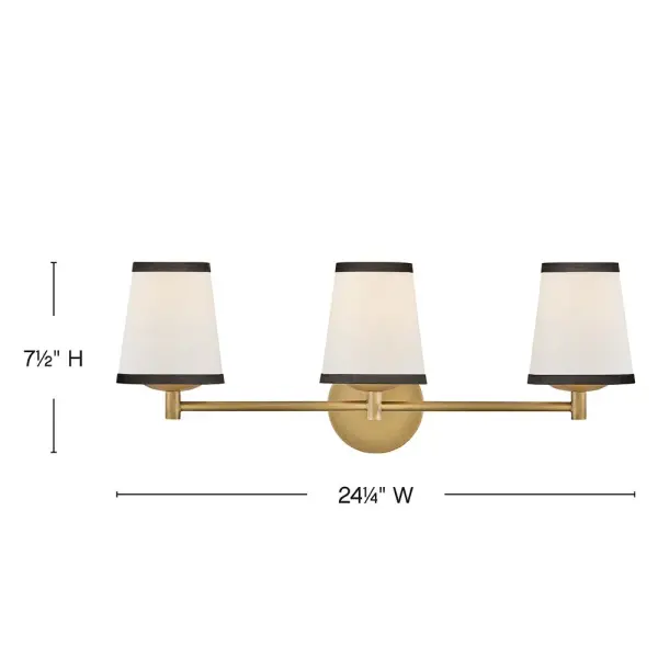 A take on traditional sconce styles, Sonia’s tapered shades feature contrasting top and bottom binding. The chic metal frame and accents are finished in versatile Lacquered Brass to complement any color palette. - alternate view