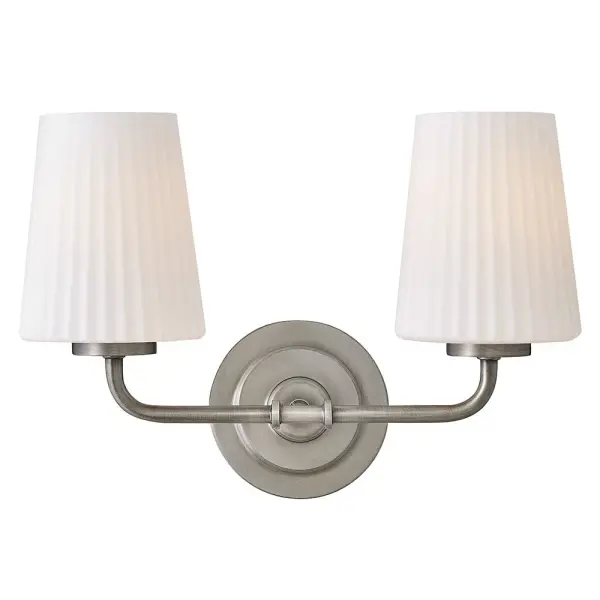Combining classic elegance with contemporary details, McKenna’s timeless silhouette shines with delicate contours. Pleated Etched Opal glass and beautiful linear details along the frame bring a touch of refinement to your décor.