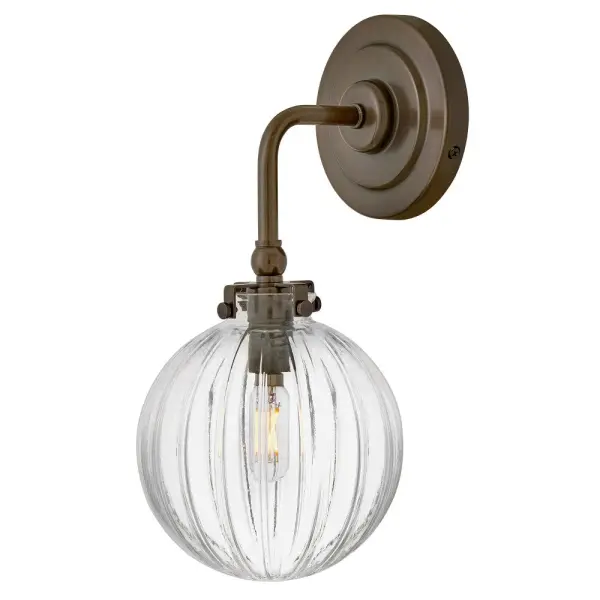 Combining vintage charm with practical design, Helene’s graceful, ribbed glass globes cast beautifully refracted light. Delicate detailing and unique knobs that secure each shade are complemented by versatile finishes that perfectly accentuate your space.