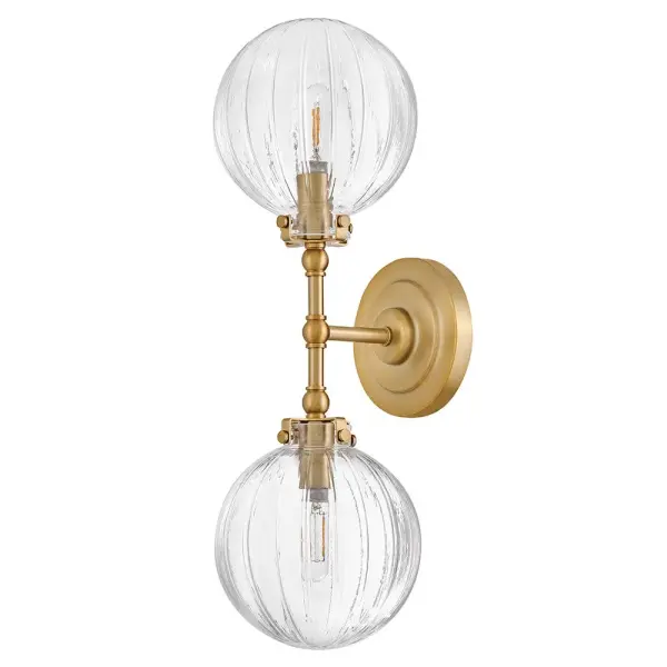 Combining vintage charm with practical design, Helene’s graceful, ribbed glass globes cast beautifully refracted light. Delicate detailing and unique knobs securing each shade are complemented by a rich Lacquered Brass finish to perfectly accentuate your space. - alternate view