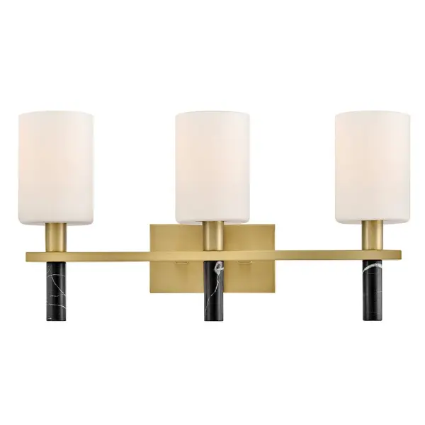 Polished with an understated silhouette, Turin is elevated by tall Etched Opal Glass and luxurious black marble stems. A minimalist backplate finished in vibrant Lacquered Brass complements the natural stone with an elegant touch of warm color.