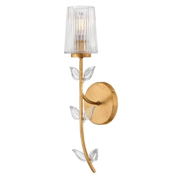 Feminine and romantic, Aliso’s thin, delicate frame is adorned with dainty, clear, pressed glass leaves. A hand-painted Distressed Brass finish enhanced by gold leaf makes a polished and luxurious statement in both traditional and modern settings
